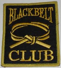 Black Belt Club Badges. Gold lettering on black background. 